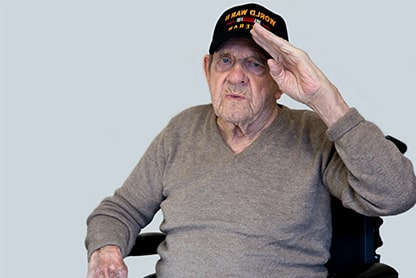 World War Two Veteran in Wheelchair Saluting